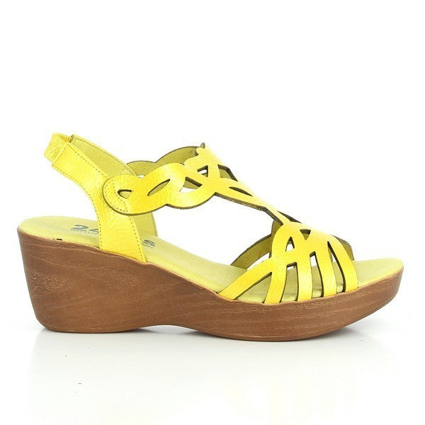 The 24 Hrs 23302 Yellow Slingback Wedges are displayed against a neutral backdrop. The wedges feature a vibrant yellow leather upper with a sleek slingback design and an adjustable buckle for a secure fit. The 6 cm heel-platform provides an elegant lift, while the classic round toe shape ensures timeless style. The soft leather lining and durable synthetic sole highlight the high-quality craftsmanship of these Spanish-made wedges, perfect for adding a cheerful touch to any outfit.