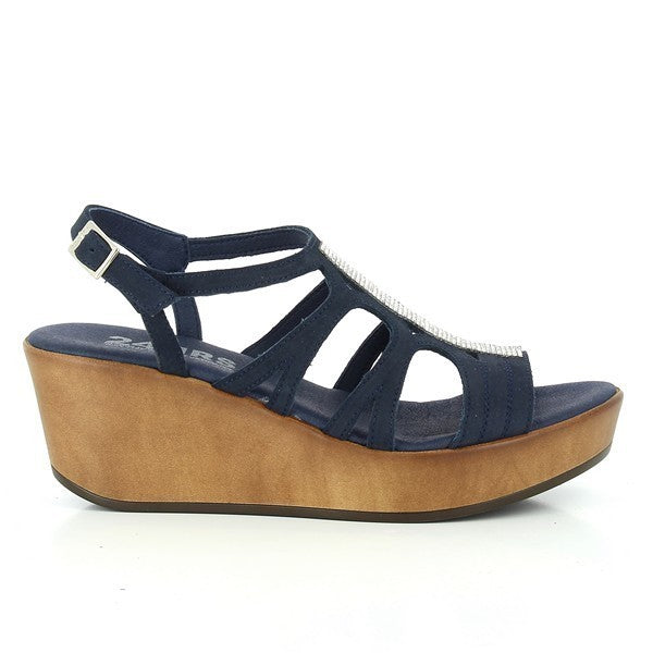 The 24 Hrs 23314 Navy Slingback Wedges are displayed against a neutral background. The wedges feature a classic navy leather upper with a sleek slingback design and an adjustable buckle for a secure fit. The 6 cm heel-platform provides a sophisticated lift, while the round toe shape adds timeless elegance. The soft leather lining and durable synthetic sole highlight the high-quality craftsmanship of these Spanish-made wedges, making them a stylish and comfortable choice for any occasion.