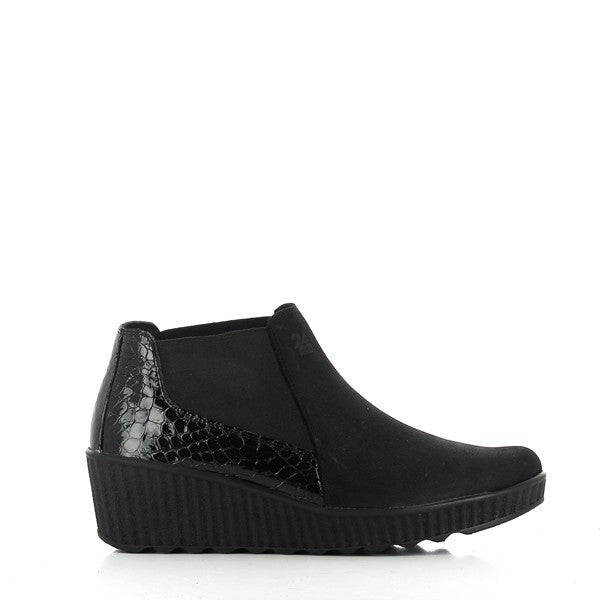 A close-up image of the 24HRS 23804 Black Ankle Boots, highlighting the smooth, premium leather upper with a sleek, polished finish. The round toe and 5 cm heel-platform are clearly visible, offering a perfect blend of style and comfort. The stitching details and the synthetic sole showcase the craftsmanship. The neutral background emphasizes the boots' elegant, versatile design.