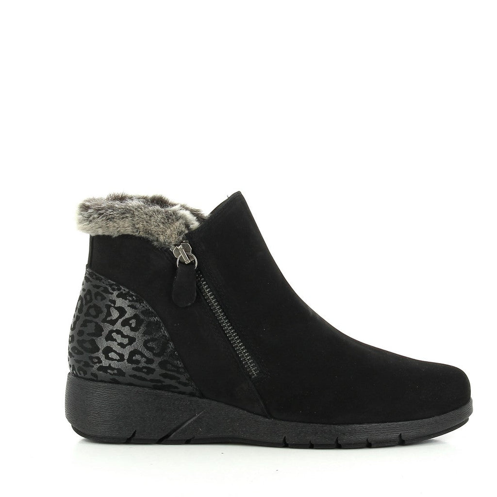A pair of 24HRS 24246 Black Ankle Boots shown from an angled side view, highlighting the sleek black leather upper and the stylish leopard print detail around the ankle. The image also captures the soft fur lining visible at the top, the convenient external zipper on the side, and the 3 cm heel-platform, emphasizing the boots' blend of fashion and functionality.