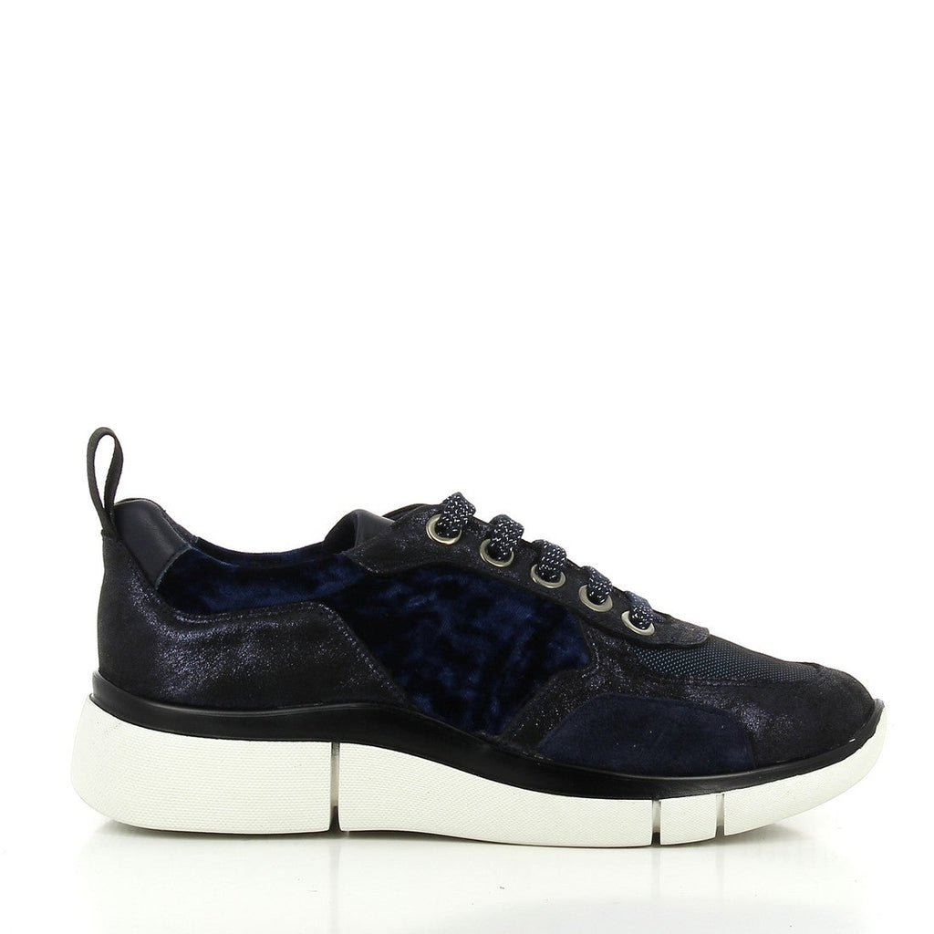 A pair of 24HRS 24307 Navy Sneakers, showcasing their sleek design with a combination of leather and material on the upper. The rich navy color adds sophistication, while the 3cm platform sole provides subtle elevation. The round toe shape is visible, along with the detailed stitching that highlights the shoe’s quality craftsmanship. The interior is lined with soft material for added comfort, and the back view displays the smooth finish of the heel area, seamlessly connected to the sole.