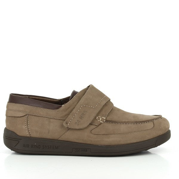 A close-up view of the 9974 Taupe Trainers, showcasing their sleek taupe leather upper. The photo captures the soft leather lining and the detailed stitching on the shoe. The synthetic sole is visible, emphasizing its durability and the 2.5 cm heel-platform height, offering subtle lift and comfort. The neutral taupe color highlights the versatility of the trainers, making them a stylish addition to any outfit.