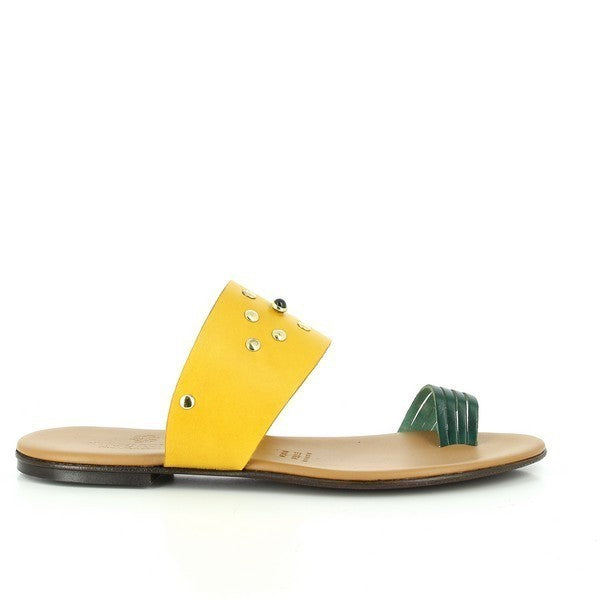 The Antichi Romani 874 Yellow Thong Slides are beautifully showcased against a light, neutral background that enhances their cheerful design. The vibrant yellow leather upper gleams softly, reflecting the premium quality synonymous with the prestigious Italian brand. The delicate thong style features a slim strap that gracefully secures the foot, while the round toe shape adds a classic appeal. 