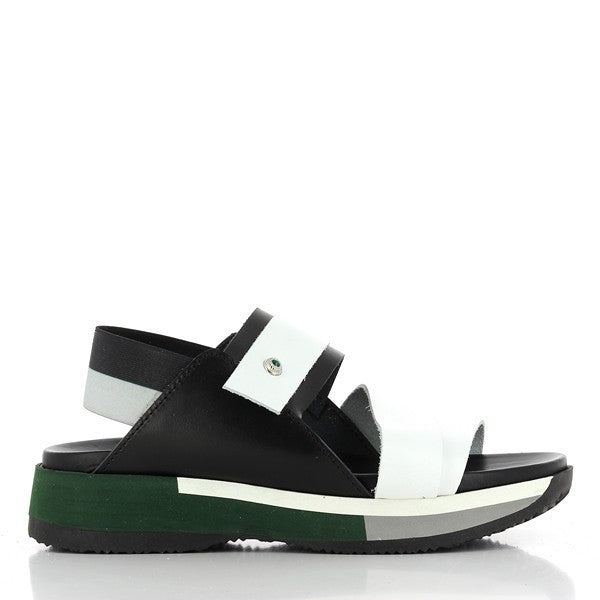 The Antichi Romani 963 Nero Black & White Slingback Sandals are shown on a simple, neutral background, highlighting their sophisticated design. The sandals feature a sleek black leather upper with a striking white leather accent across the front, creating a bold contrast. The round toe shape and 3cm heel-platform add to the stylish, comfortable look. The slingback strap with a subtle buckle closure offers a secure fit while accentuating the refined lines of the sandals. 