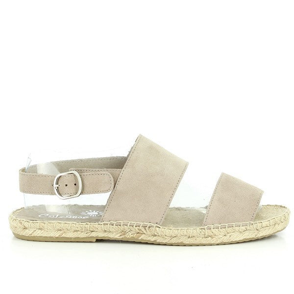 The Calzanor 2080 Natural Slingback Espadrilles are elegantly presented on a soft, textured surface that enhances their natural appeal. The leather upper in a warm, earthy tone showcases a smooth finish, while the slingback strap gently curves around the heel, adding a sophisticated touch. The rounded toe design offers a classic silhouette, and the subtle 1 cm jute platform sole is visible, highlighting the eco-friendly craftsmanship. 