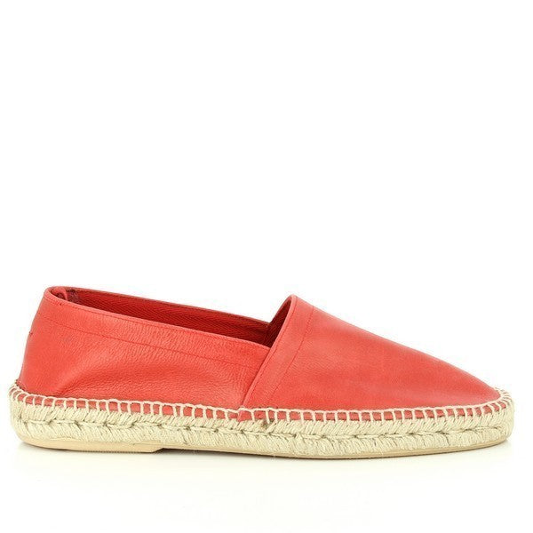 The Calzanor 640PO Red Espadrilles feature a bold red leather upper that commands attention and adds a vibrant touch to any outfit. Handcrafted in Spain, these espadrilles showcase a classic round toe shape and a soft leather lining for exceptional comfort. The 2cm synthetic platform heel provides a slight lift while ensuring stability, making them suitable for all-day wear. The meticulous craftsmanship highlights Calzanor's dedication to quality, making these espadrilles a stylish and timeless addition.