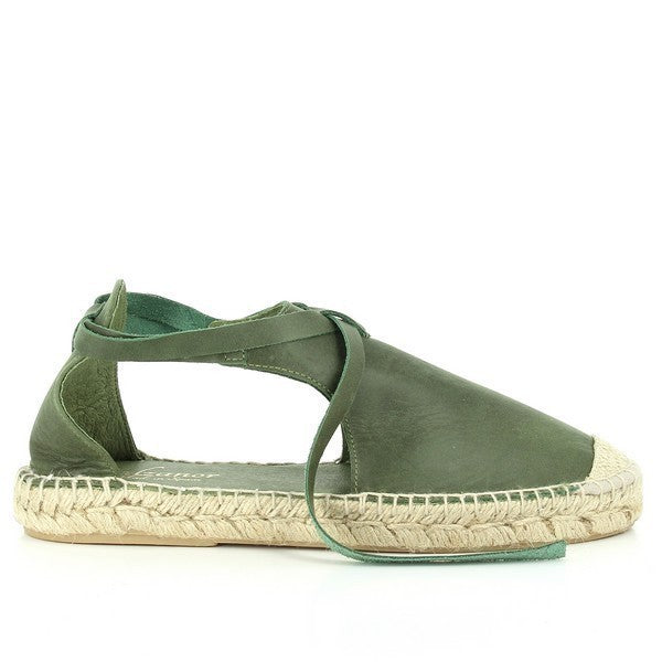 The Calzanor 9307BPO Khaki Lace-Up Espadrilles are displayed from a side angle, showcasing their elegant design and distinctive lace-up detail. The rich khaki leather upper features subtle stitching, highlighting the artisanal craftsmanship. The round toe shape offers a comfortable fit, while the jute-wrapped sole is visible, emphasising the sustainable materials used in their construction. 