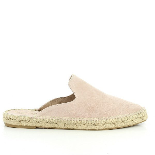 The image displays the Calzanor 9409PO Pink Slide Espadrilles, showcasing their charming pink hue that adds a cheerful touch to any outfit. The espadrilles feature a soft leather upper and lining, ensuring a comfortable fit while maintaining a stylish appearance. The classic round toe shape complements their design, and the natural jute fiber sole is visible, highlighting the eco-friendly materials used in their construction. 