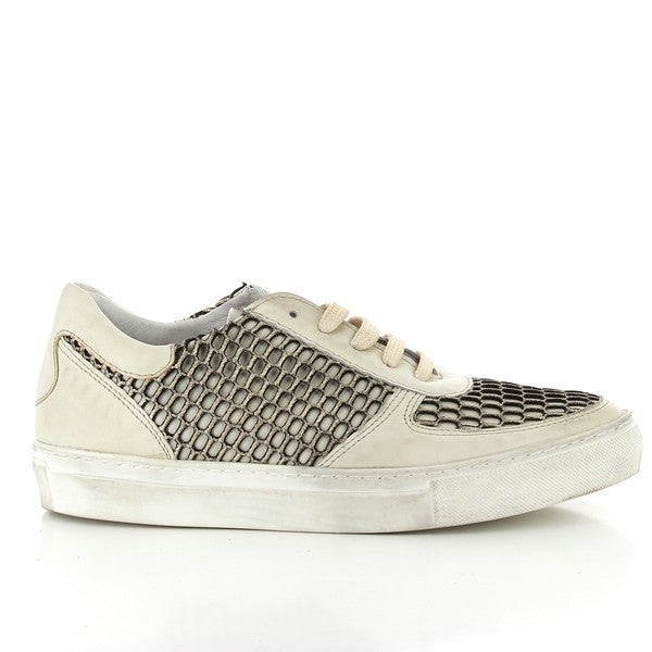 A clean and minimalist side profile of the Felmini A137 Beige Sneakers, showcasing the smooth, high-quality leather upper with subtle stitching details and the sleek, rounded toe design.

