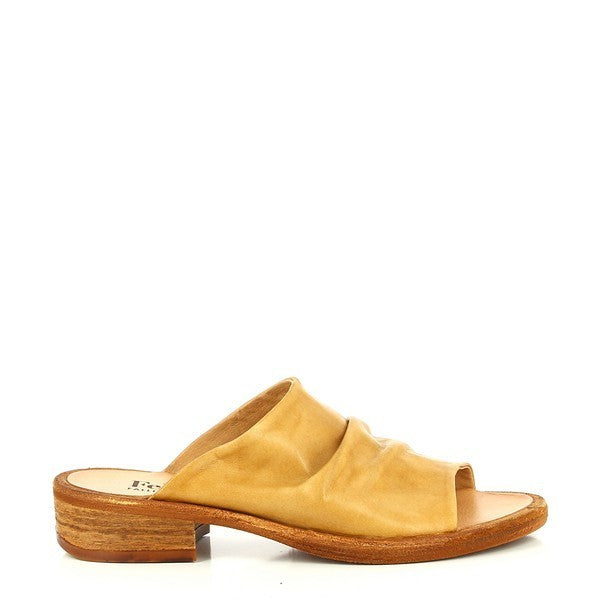 A profile shot of the Felmini B691 Tan Slides showcasing the sleek leather upper, smooth lines, and round toe shape. The slide’s clean design is highlighted, emphasizing its minimalist and elegant silhouette.