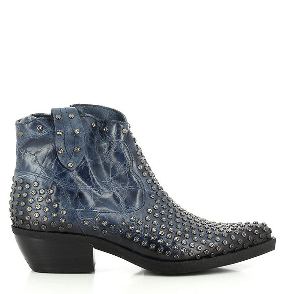 A sleek side profile of the Felmini B920 Ink Ankle Boot, showcasing its smooth leather upper, pointy toe shape, and subtle silver studs adorning the sides for a chic touch.