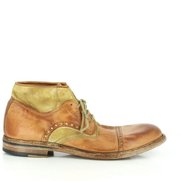 The Forte 2034 Brown Lace-Up Boot features a sleek profile with two-tone brown leather, showcasing its brogue detailing along the sides, emphasizing a refined yet rugged look.