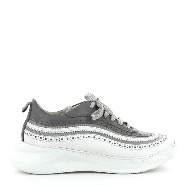 The side profile of the Forte S20 Max Grey & White Sneakers, showcasing the sleek leather upper with contrasting grey and white tones. The clean, modern silhouette highlights the round toe and smooth, streamlined design.