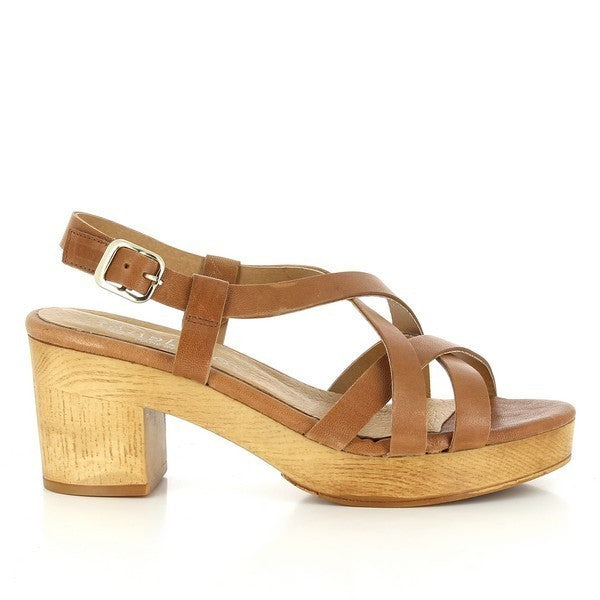 A full-profile image of the Igualados 2339 Tan Slingback Sandal, showcasing the elegant cross-strap design, open-toe silhouette, and slingback strap with a small buckle. The smooth leather upper and 6cm heel-platform are visible, highlighting the sandal's refined craftsmanship.