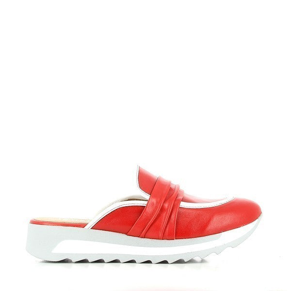 A sleek red loafer-style mule with a smooth leather upper, a contrasting white sole, and refined detailing, showcasing its elegant yet casual design.