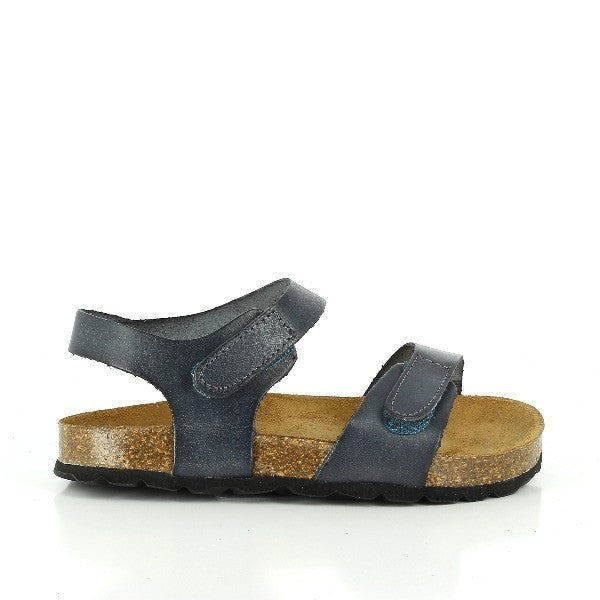 A sleek and stylish black sandal showcased against a neutral backdrop. Its minimalist design exudes sophistication, perfect for both casual and formal occasions. Crafted with premium materials, this sandal promises comfort and elegance with every step.