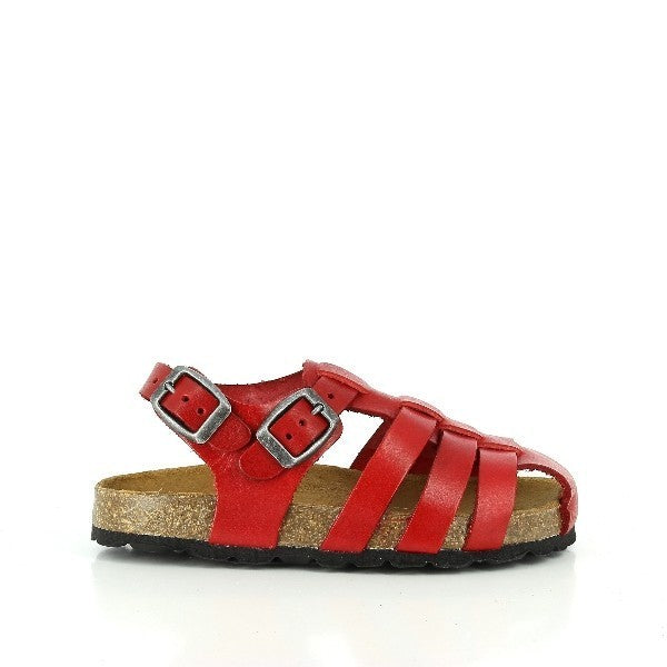 The photo showcases Plakton's 115096 Red Kids Cage Sandals, emphasizing their vibrant red hue and stylish cage design. Crafted with eco-friendly cork soles and leather uppers, these sandals offer both comfort and sustainability. The adjustable ankle strap ensures a secure fit, while the round toe shape provides ample room for little toes to move freely. Made in Spain with attention to detail, these sandals are the perfect choice for your child's summer wardrobe.