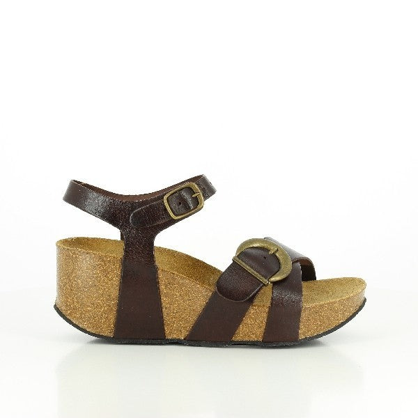 Capture the elegant profile of Plakton's 273022 Dark Brown Wedges, highlighting the luxurious leather upper and eco-friendly cork sole. Ideal for elevating your style with comfort and sustainability.